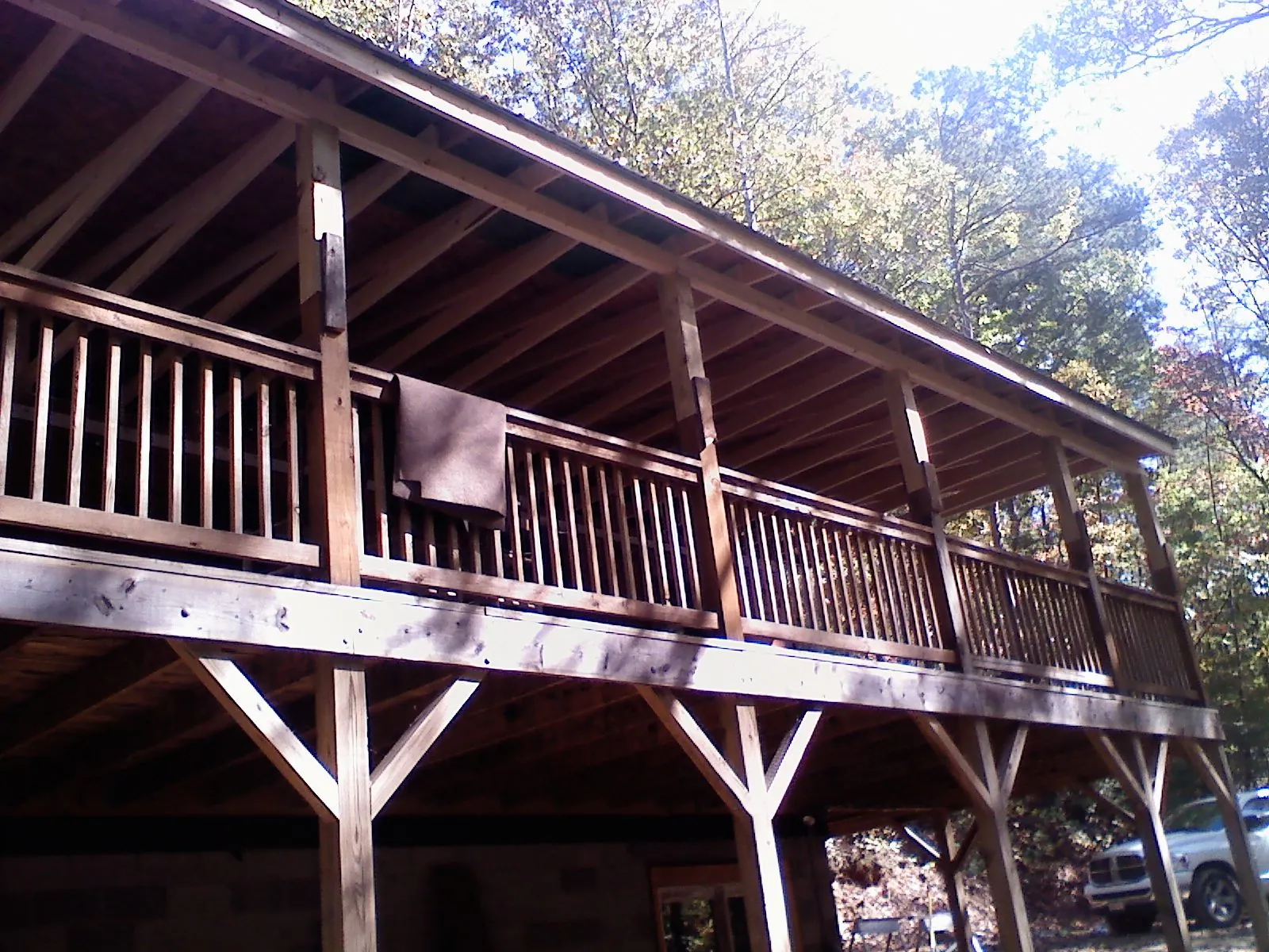 Timber framing under a new elevated porch and deck — Roof Leak Repair in Hyattsville by Roofing Brothers